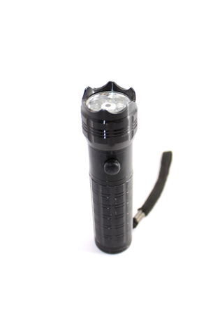 Small flashlight on white background