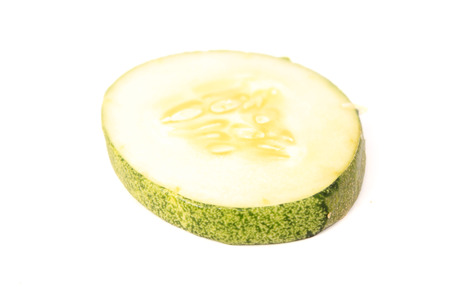 Sliced cucumber over white backgroundの写真素材