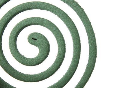 Mosquito coil isolated on whiteの写真素材