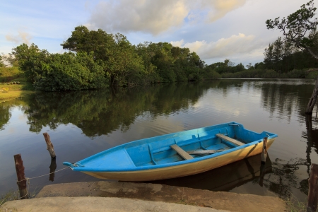 Boat and lake at sunsetの写真素材