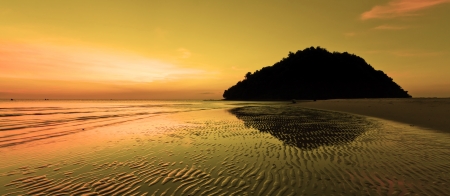 Warm sunset at a beach in Sabah, Borneo, Malaysiaの写真素材