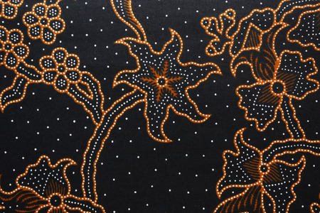 Fabric with floral batik patternの写真素材
