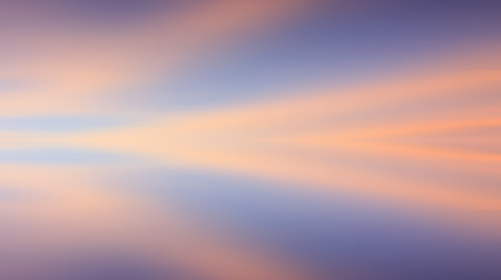 Reflection of colorful sunset with long exposure effect, motion blurredの写真素材
