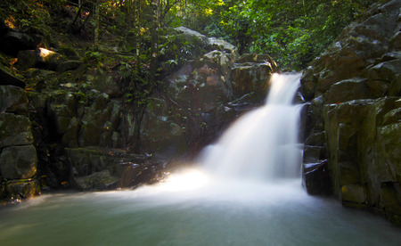 Tropical waterfall at a rainforest in Borneoの写真素材