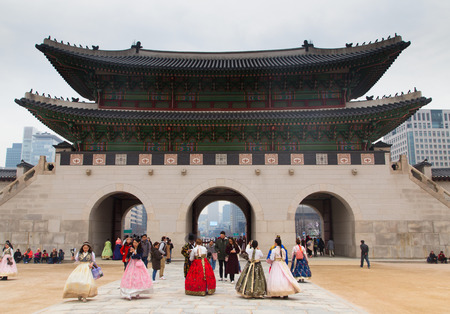 Gyeongbokgung, Seoul/South Korea - March 18 2018 : Group of tourist wearing Korean traditional costume in the palace.のeditorial素材