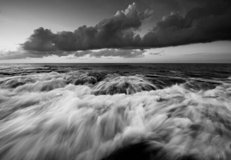 Dramatic long exposure waves in black and white taken in Kudat, Sabah, Malaysiaの写真素材