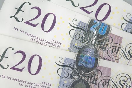 twenty pound notes in a fan shapeの写真素材