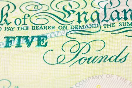 close up macro image of a five pound noteの写真素材