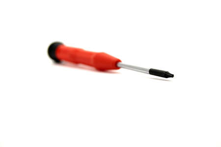 A torx screwdriver with a red handleの写真素材