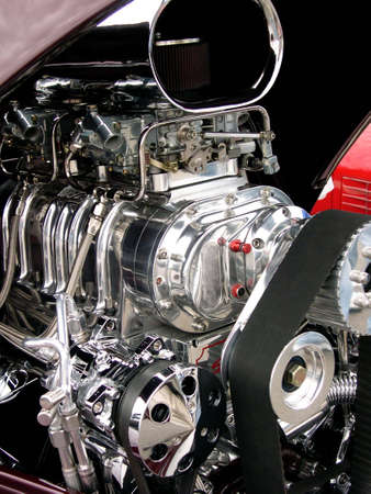 A chromed engine blower in this customized show car.の写真素材