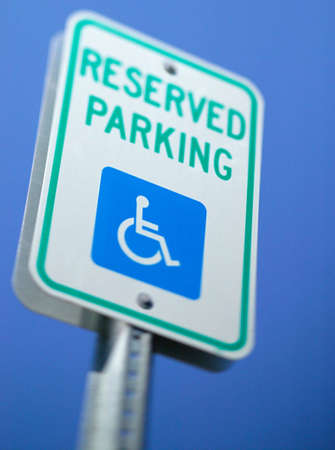 A handicap reserved parking sign for those who are physically disabled.の写真素材
