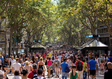 BARCELONA, SPAIN - AUGUST 19, 2013  The busy high street of La Rambla in Barcelona during the day on August 19 2013のeditorial素材