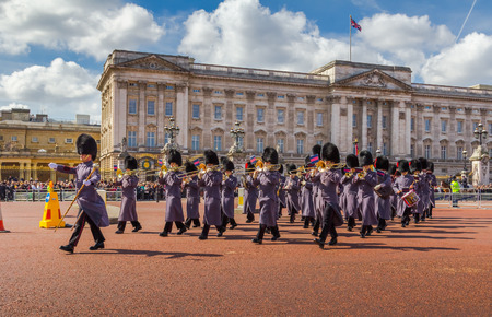 LONDON, UK - 24TH MARCH 2014  The Queens Guards musicians coming out of Buckingham Palace during the Changing of the Guardのeditorial素材