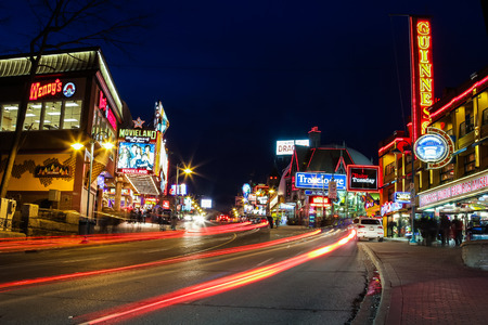 NIAGARA FALLS, CANADA - 12TH APRIL 2014  Part of the  Centre Street in Niagara Falls at night where many entertainment attractions as well as the blur of people and trafficのeditorial素材