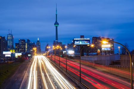 TORONTO, CANADA - 22ND APRIL 2014  Light trails on the  Gardiner Expressway leading up to the CN...