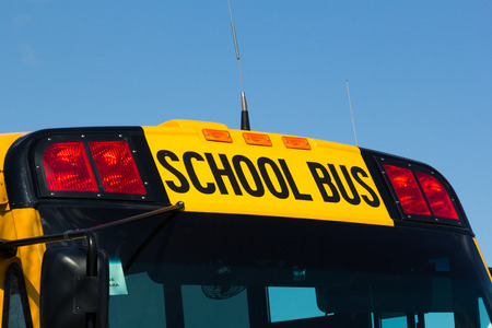 TORONTO, CANADA - 27TH APRIL 2014  Closeup to the School Bus words on a Yellow School bus in Toronto