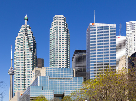 TORONTO, CANADA- 11TH MAY 2014  The TD, CIBC, BMO and other Skyscrapers during the day with the CN Tower in the backgroundのeditorial素材