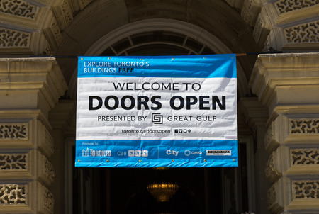 TORONTO, CANADA - 25TH MAY 2014  A sign on a building for the Doors Open event in Toronto, Canadaのeditorial素材