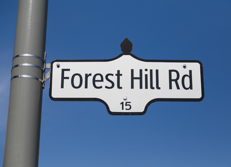 TORONTO, CANADA - 29TH JUNE 2014: A sign for Forest Hill Road in Torontoのeditorial素材