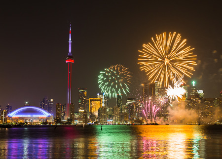 TORONTO, CANADA - 30TH JUNE 2014: Fireworks in Toronto for Canada Day showing the City and local landmarksのeditorial素材