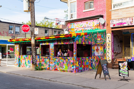 TORONTO, CANADA - 4TH SEPTEMBER 2014: The outside of the Big Fat Burrito Building located in Kensington Market Torontoのeditorial素材