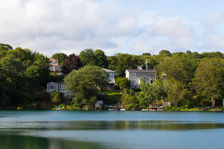 HALIFAX, NOVA SCOTIA - 22ND AUGUST 2014: Houses along Chocolate Lake in Halifax during the dayのeditorial素材