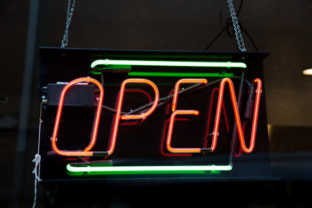 Closeup to a typical Open Sign on a storeの写真素材