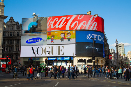 LONDON, UK - 26TH SEPTEMBER 2014: Part of Piccadilly Circus during the day showing large amounts of people outsideのeditorial素材