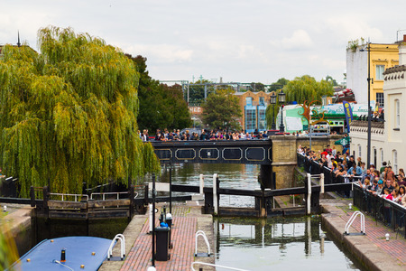 LONDON, UK - 27TH SEPTEMBER 2014: Part of Camden Locks during the day showing large amounts of people either sideのeditorial素材