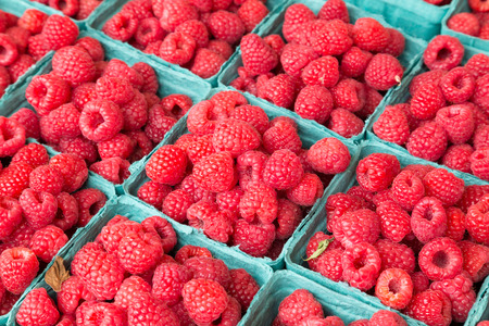 Closeup to raspberries at a market
