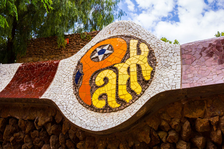 BARCELONA - SPAIN - 17TH AUGUST 2013: A mosaic for Park Guell in Barcelona during the dayのeditorial素材