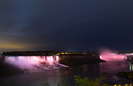 NIAGARA FALLS, CANADA - 3RD NOVEMBER 2014: The American and Horseshoe Falls at nightのeditorial素材