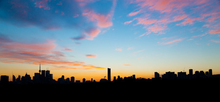 Downtown Toronto at Dusk with a very colorful skyの写真素材