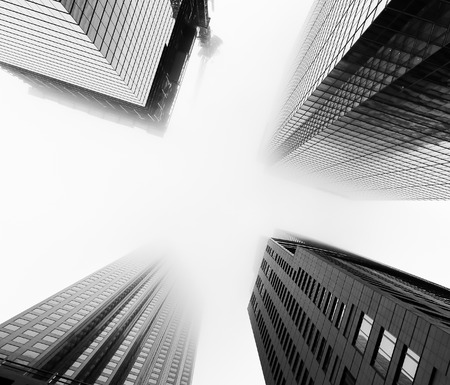 TORONTO, CANADA - 24TH DECEMBER 2014: A low view of skyscrapers in downtown Toronto during a day when the clouds and fog is Low-lyingのeditorial素材