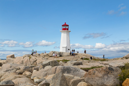 PEGGYS COVE, CANADA - 23RD AUGUST 2014: Peggy's Cove Lighthouse during the day with copyspaceのeditorial素材