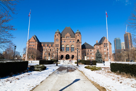 TORONTO, CANADA - 13TH JANUARY 2015: The outside of the Ontario Parliament Building during the day. People can be seen outsideのeditorial素材