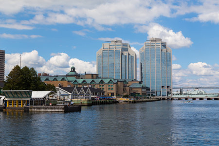 HALIFAX, CANADA - 24TH AUGUST 2014: Part of the Halifax waterfront during the day showing buildings and peopleのeditorial素材