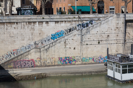 ROME, ITALY - 12TH MARCH 2015:  Graffiti along the River Tiber and along pedestrian stepsのeditorial素材
