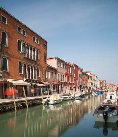 MURANO, ITALY - 14TH MARCH 2015: A view along Fondamenta Dei Vetrai footpath in Murano during the day, showing shops, boats, buildings and peopleのeditorial素材