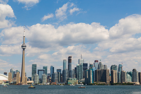 TORONTO, CANADA - 6TH JULY 2014: Toronto Skyline during the summer, showing buildings, the CN Tower and boats in the water.のeditorial素材