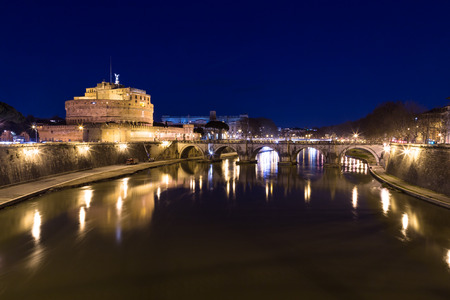Castel Sant'Angelo (Castle of the Holy Angel) and Ponte Sant'Angelo bridge at night.のeditorial素材