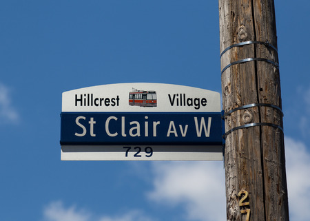 TORONTO, CANADA - 2ND JUNE 2015: A closeup to a sign for St Clair Avenue West in the Hillcrest Village area of Torontoのeditorial素材