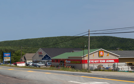 CAPE BRETON, CANADA - 4TH JULY 2015: A CO-OP and Home Building Centre store along a road in Cape Breton during the dayのeditorial素材