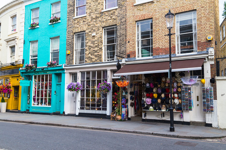 LONDON, UK - 16TH JULY 2015: The outside of shops along Portobello Road in the Nottinghill Area of London.のeditorial素材