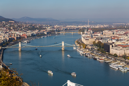 BUDAPEST, HUNGARY - 30TH OCTOBER 2015:  A high view over the River Danube in Budapest during the day. Buildings boats and bridges can be seen.のeditorial素材