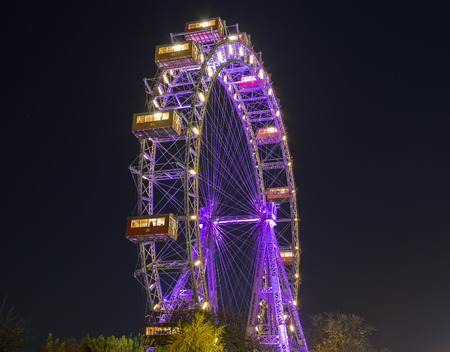 VIENNA, AUSTRIA - 12TH NOVEMBER 2015: A view of the Wiener Riesenrad in Prater from outside the park at night during the end of Autumnのeditorial素材