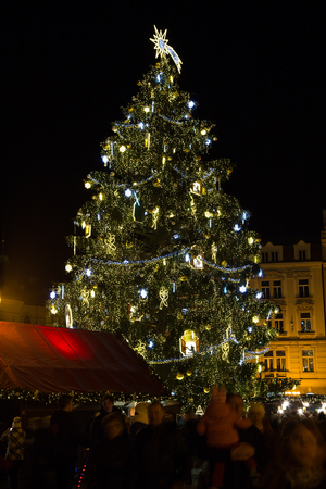 PRAGUE, CZECH REPUBLIC - 6TH DECEMBER 2015: The Christmas Tree at Old Town Square in Prague during the festive season. People can be seen.のeditorial素材