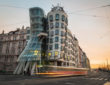 PRAGUE, CZECH REPUBLIC - 5TH DECEMBER 2015: The outside of the Dancing House (Fred and Ginder) building during the day. The blur of traffic can be seen going past.のeditorial素材