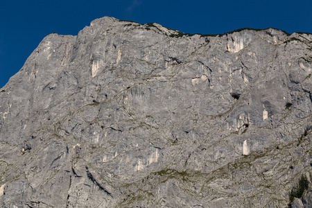 Closeup to a sheer limestone rock face in the Salzkammergut part of Austria. There is space for text.の写真素材