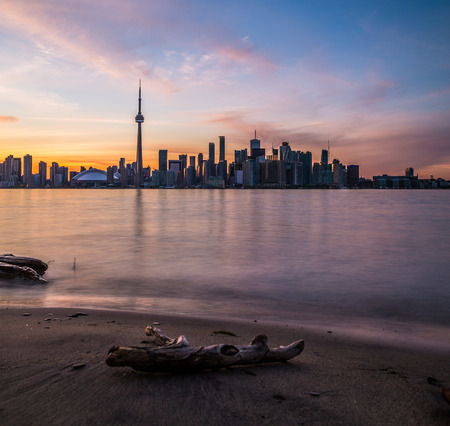 TORONTO, CANADA - 7TH JUNE 2015: Toronto Skyline during a colorful Sunset. Lots of buildings can be seen.のeditorial素材